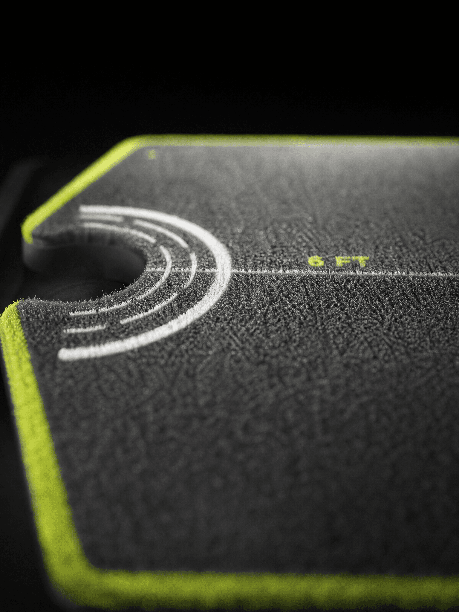 Close view of the NDoorPutt putting surface and distance references.